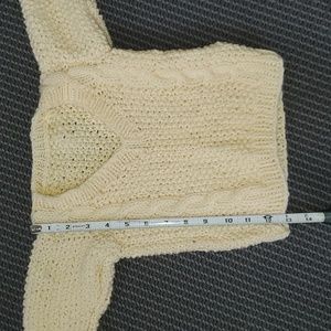 Hand knit sweater.